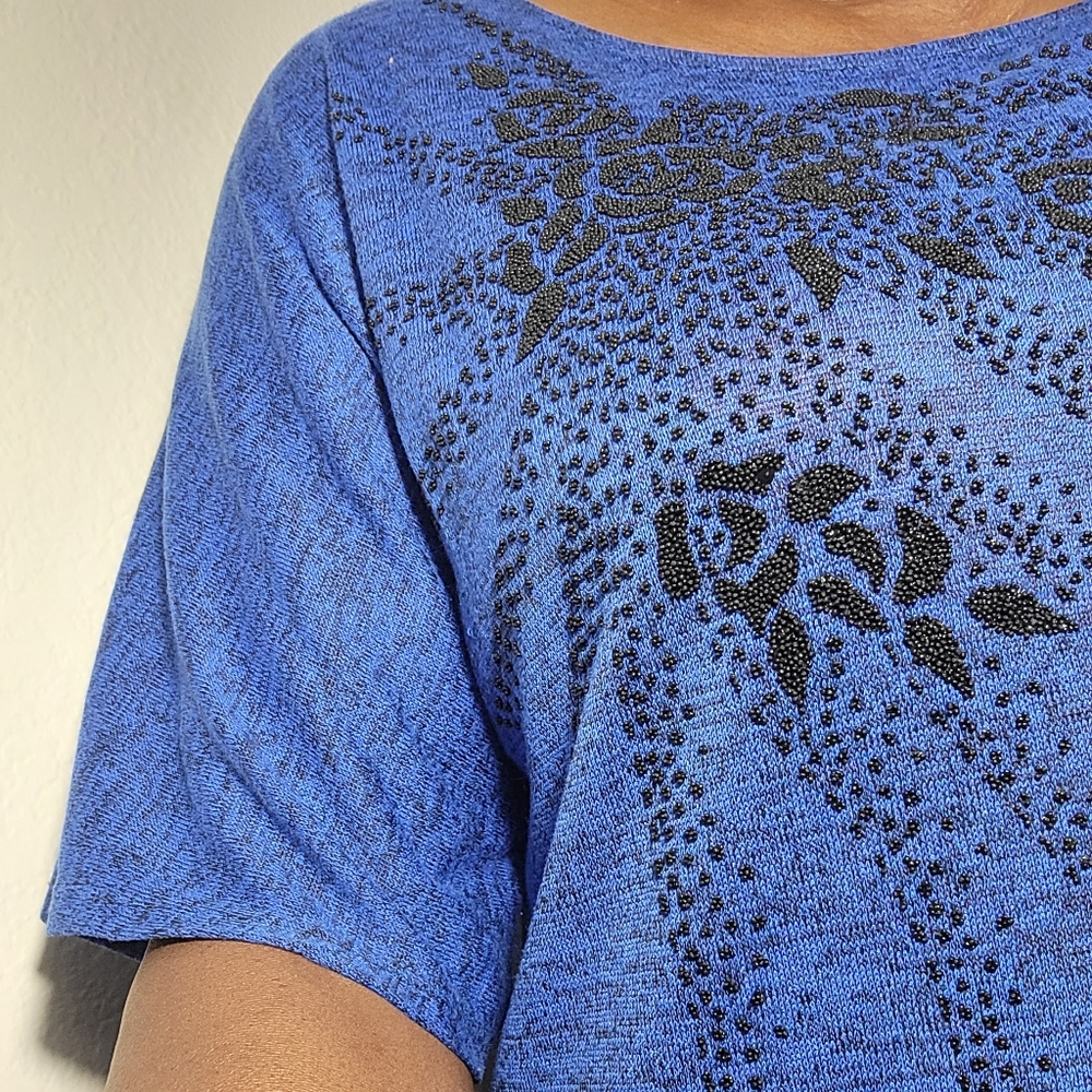 Black on blue top